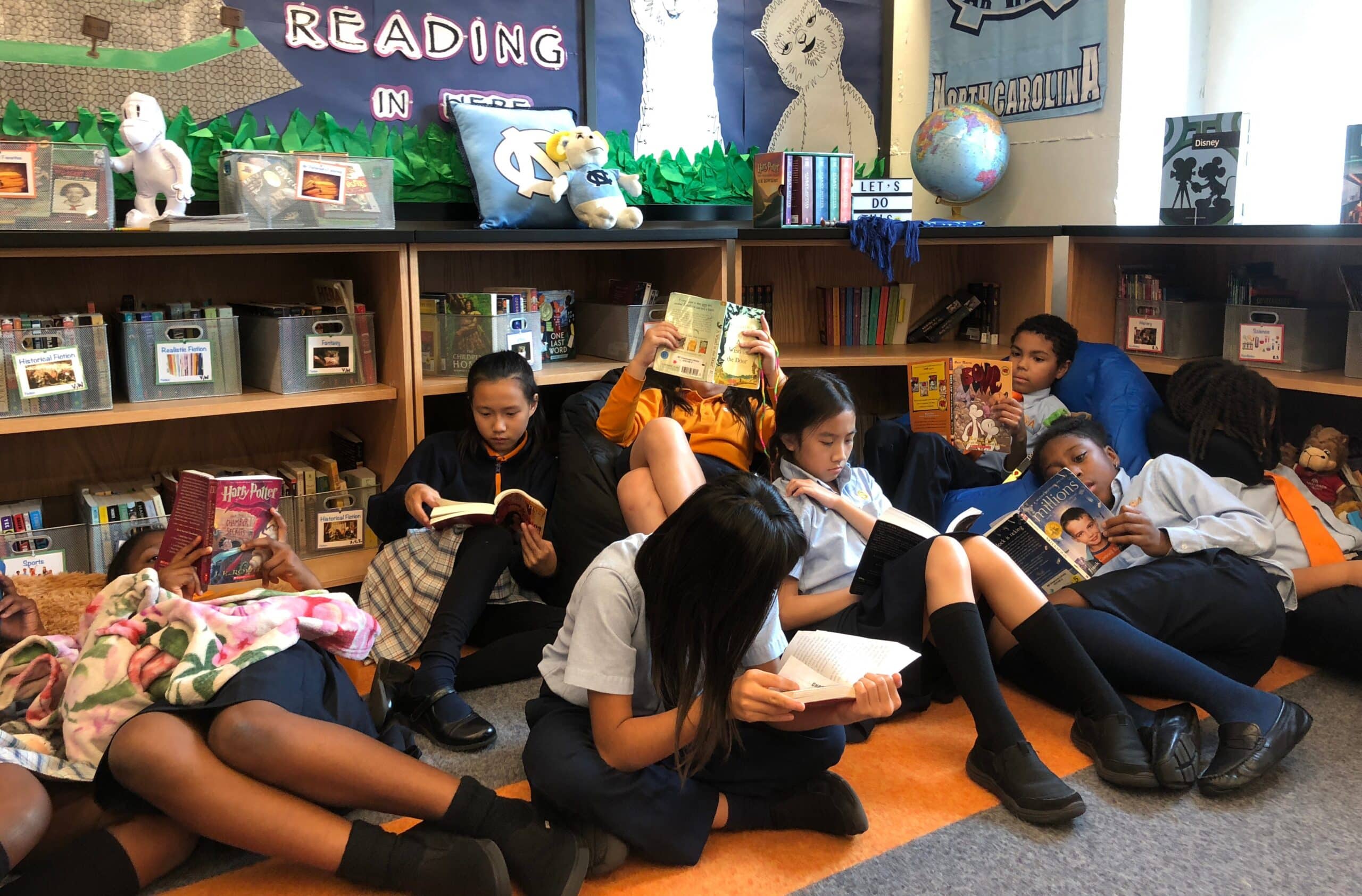 group of kids reading